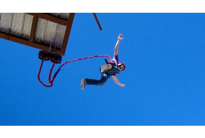 man in mid-air on flightline free fall device