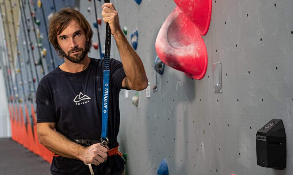 In this video Chris Sharma explains how he uses TRUBLUE Auto Belays to train at his newly opened state of the art climbing gym, Sharma Climbing Madrid, including these three main tips: mileage, campusing and just climb!